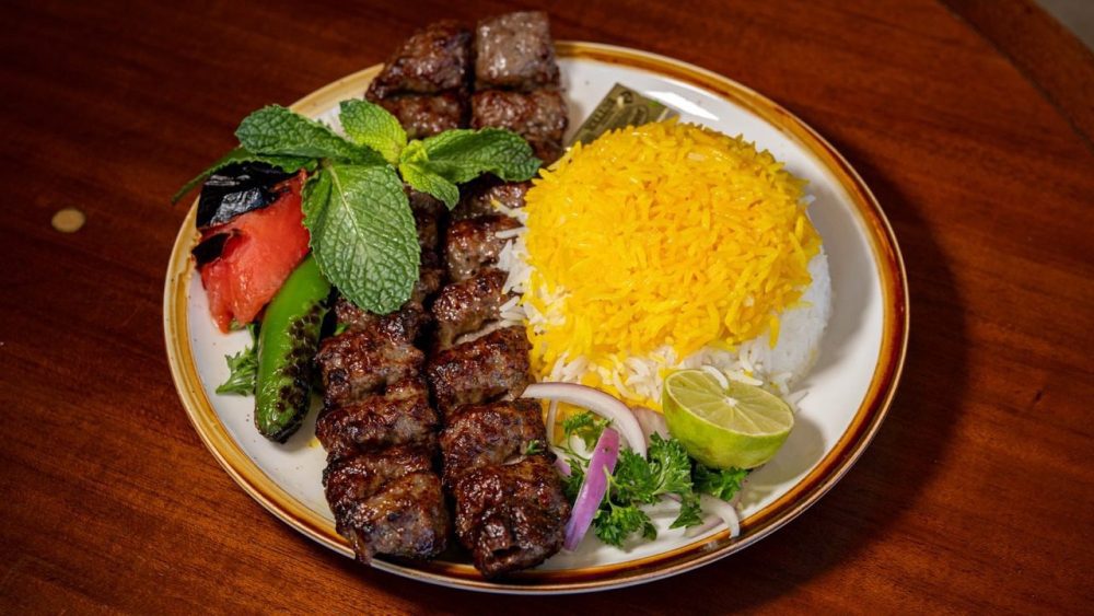 Juicy, marinated Chenjeh Kebab grilled to perfection—tender chunks of beef bursting with Mediterranean flavors.